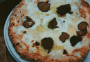 Pizza with Mozzarella, Olive Oil, and Sliced Black Summer Truffle